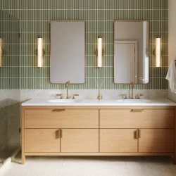 Wood double vanity with gold faucets below green stacked wall tile, bathroom remodeling in Wilmette